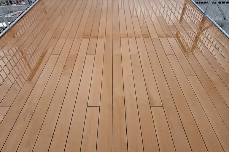 wood decking board in rainy conditions